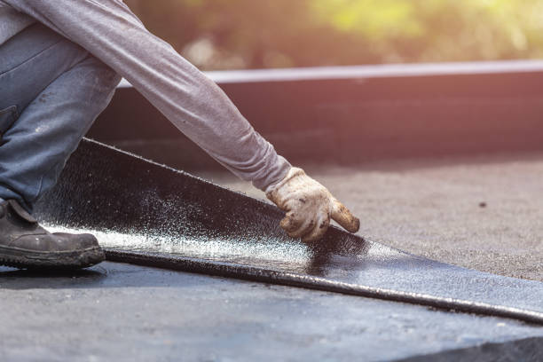 Professional Basement Waterproofing technician working in Coatesville, IN